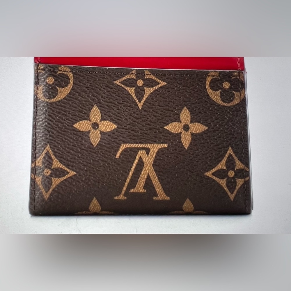 Zoe Wallet Monogram Canvas and Leather wallet.